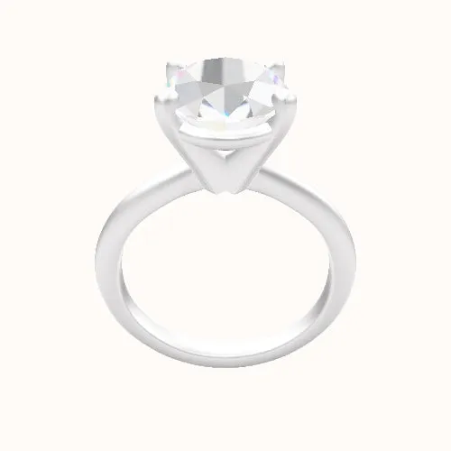 Beveled Solitaire Engagement Ring With High Set Four Prong Head