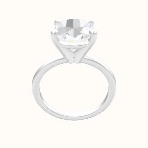 Classic Solitaire Engagement Ring With High Set Four Prong Head