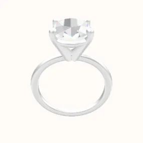 Classic Solitaire Engagement Ring With High Set Four Prong Head